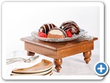 Chocolate Tuxedo Bombe
This decadent dessert is made with thick layers of white and dark chocolate mousse. Covered with a crunchy chocolate ganache and drizzled with white ganache.
