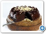Bourbon Chocolate Cake
A must have! This is a rich chocolate cake infused with bourbon liquor, layered and iced with chocolate fudge. Finished with white and dark chocolate chips.
