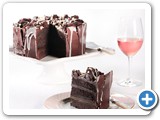 Chocolate Earthquake Cake
Our Signature Cake. This decadent dessert is sure for the chocolate lover… layers of chocolate cake, chocolate fudge brownie and chocolate fudge are the WOW in this cake. Crowned with pieces of brownie and chocolate chips, enrobed with dark chocolate ganache. Fit for a chocaholic!